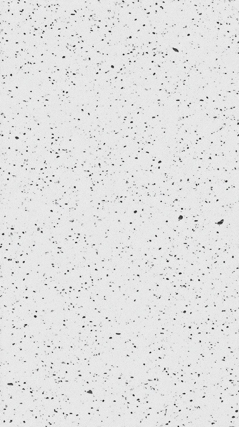 white microcement texture with a fine speckled surface and scattered tiny black and gray dots