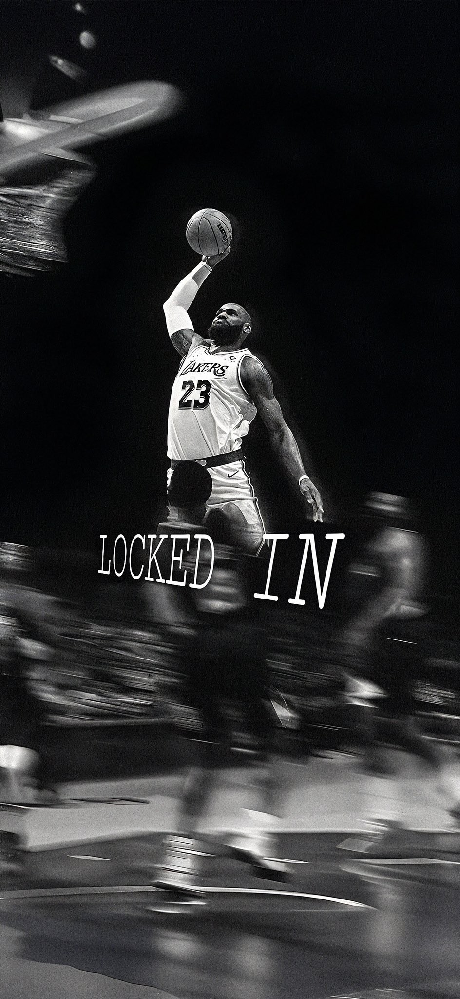 A dynamic black and white shot of LeBron James dunking
