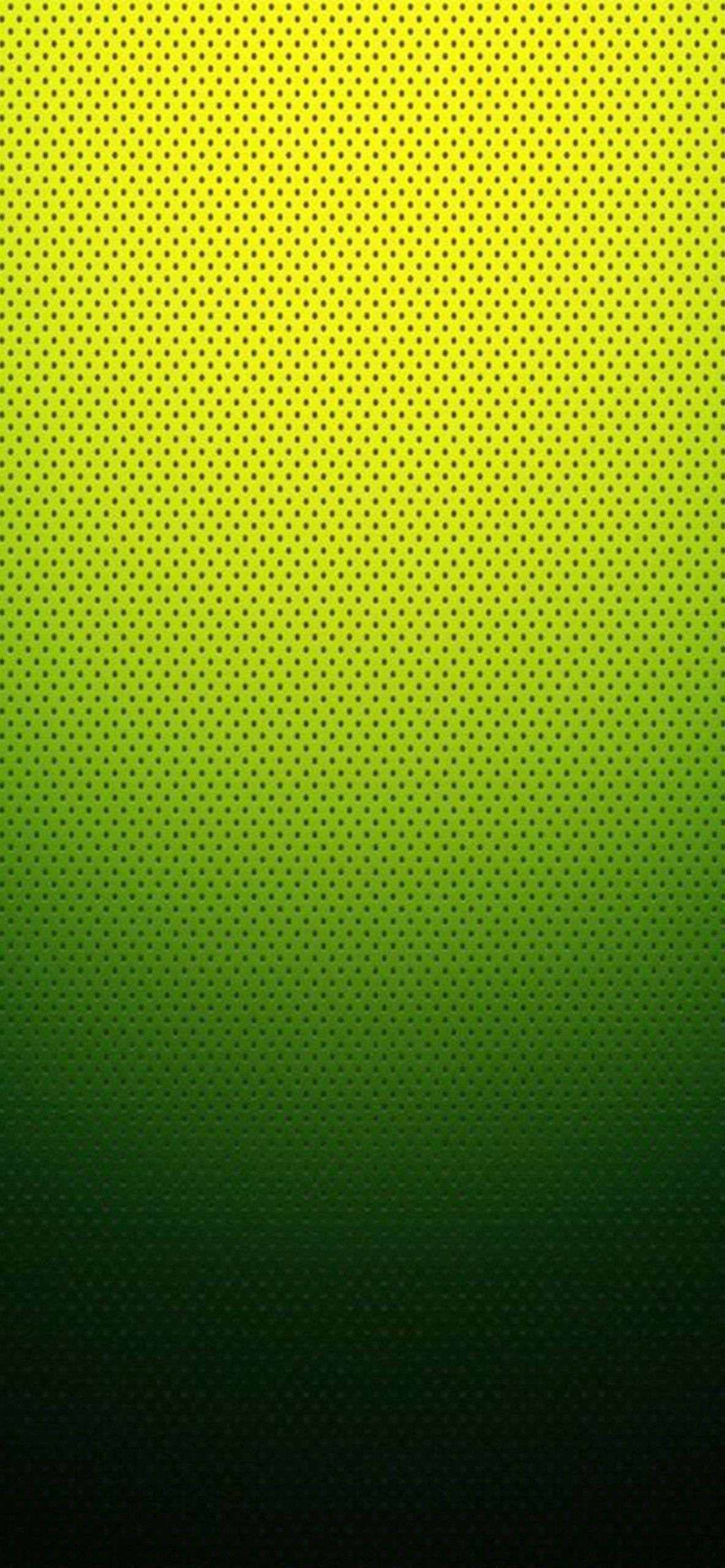 The polka dot gradient wallpaper features a yellow-green gradient background with a regular polka dot pattern for a vibrant display