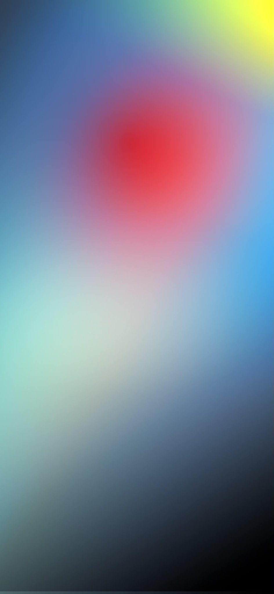 This is a colorful blurred gradient spot wallpaper suitable for lock screens or desktops
