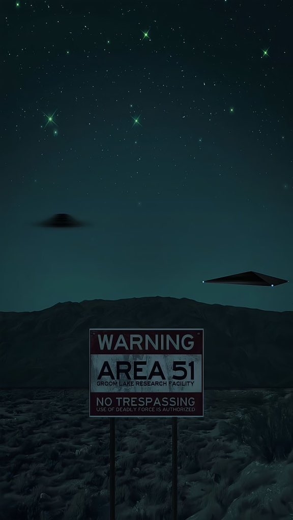 The warning sign of Area 51 stands in the desert while a UFO flies over the mountains under the starry sky