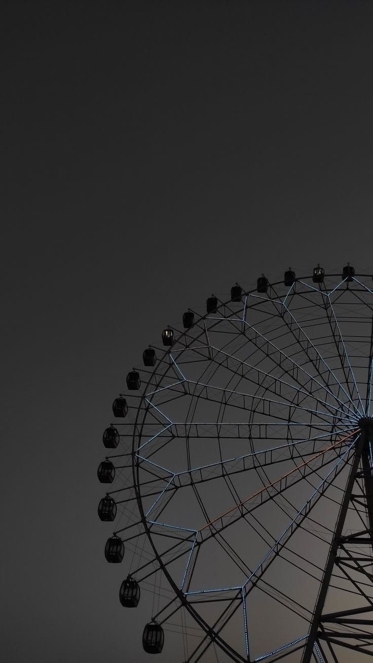 暗夜摩天輪的浪漫剪影手機壁紙