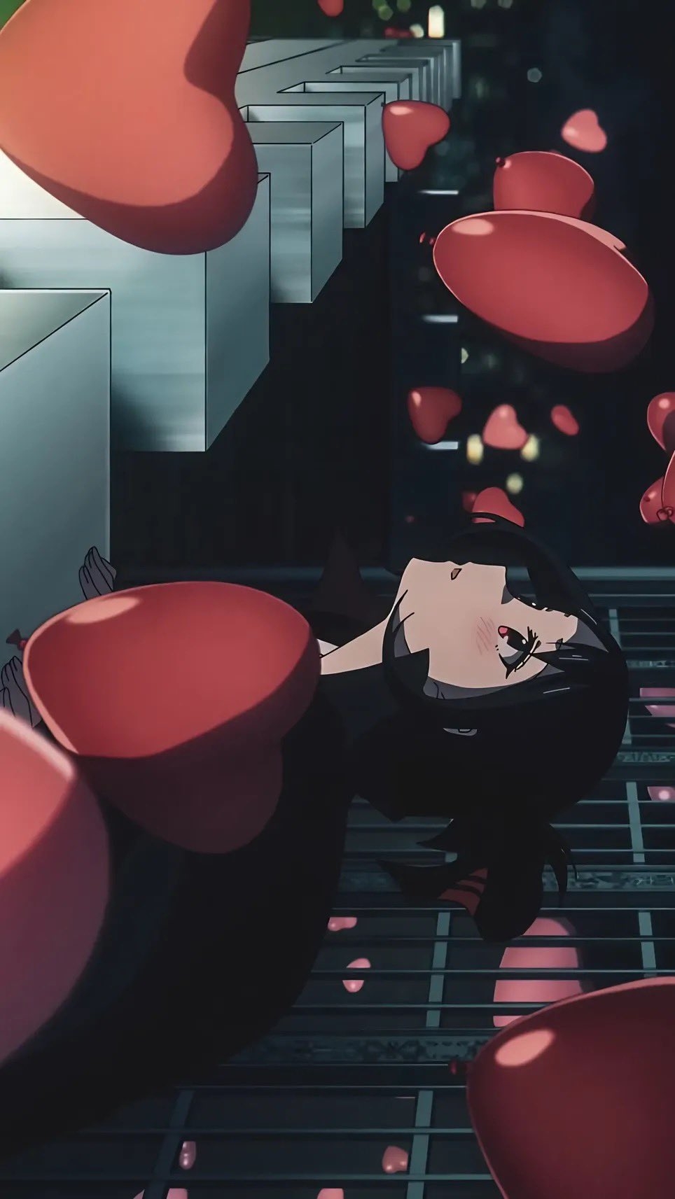 A black-haired girl lies on a metal grating with a dreamy atmosphere created by floating pink capsules