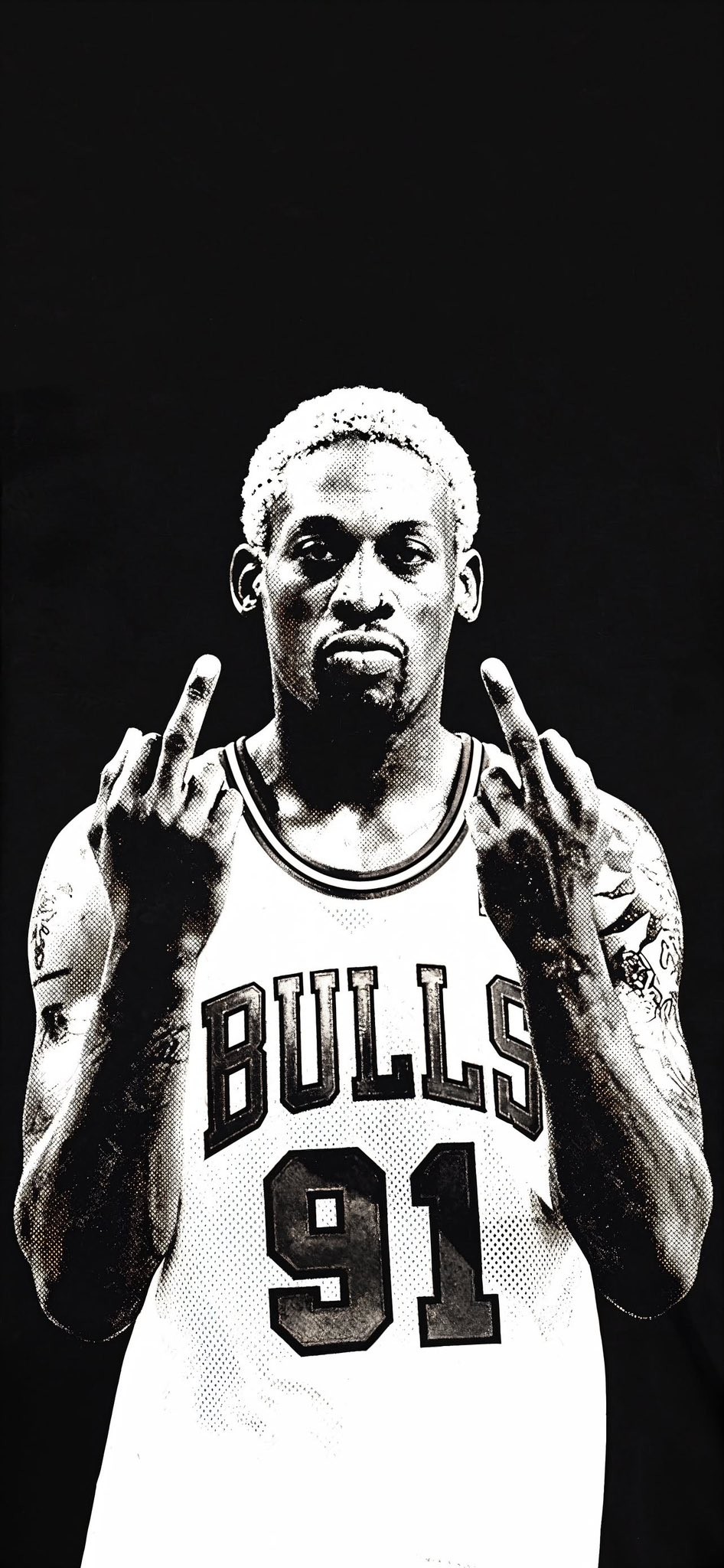 A high-contrast black and white portrait of Dennis Rodman in his Bulls 91 jersey giving the camera the middle finger