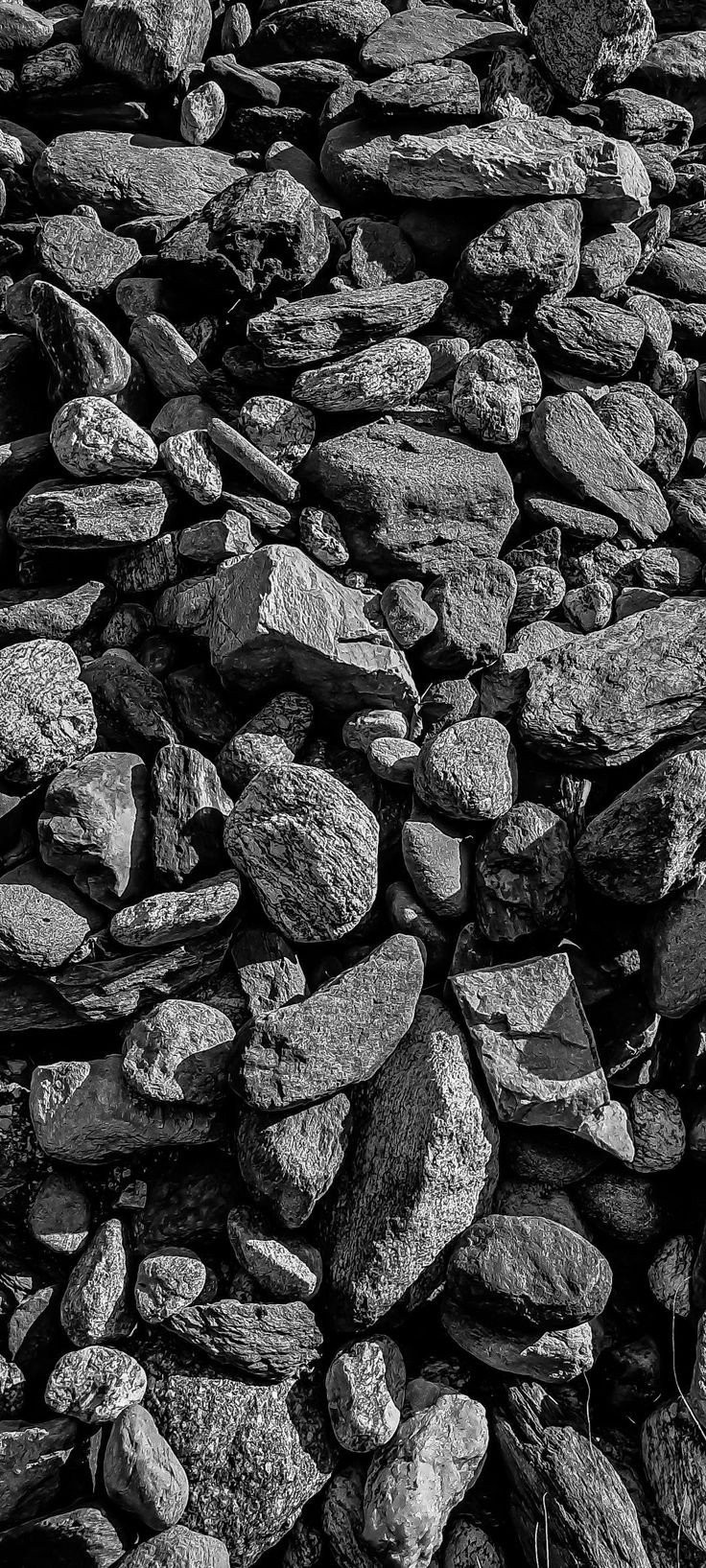 Un fond d'écran à texture de galets haute définition pour les amateurs de minimalisme