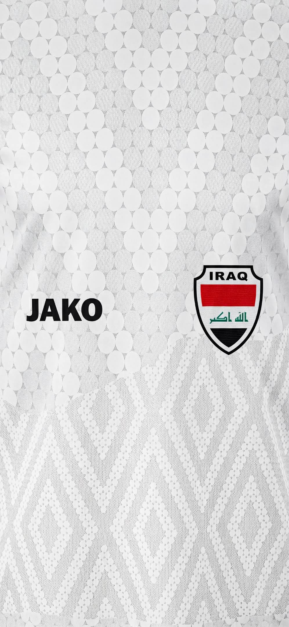 This is a modern white sports jersey featuring the black JAKO brand name on the left chest and the Iraq national team crest on the right