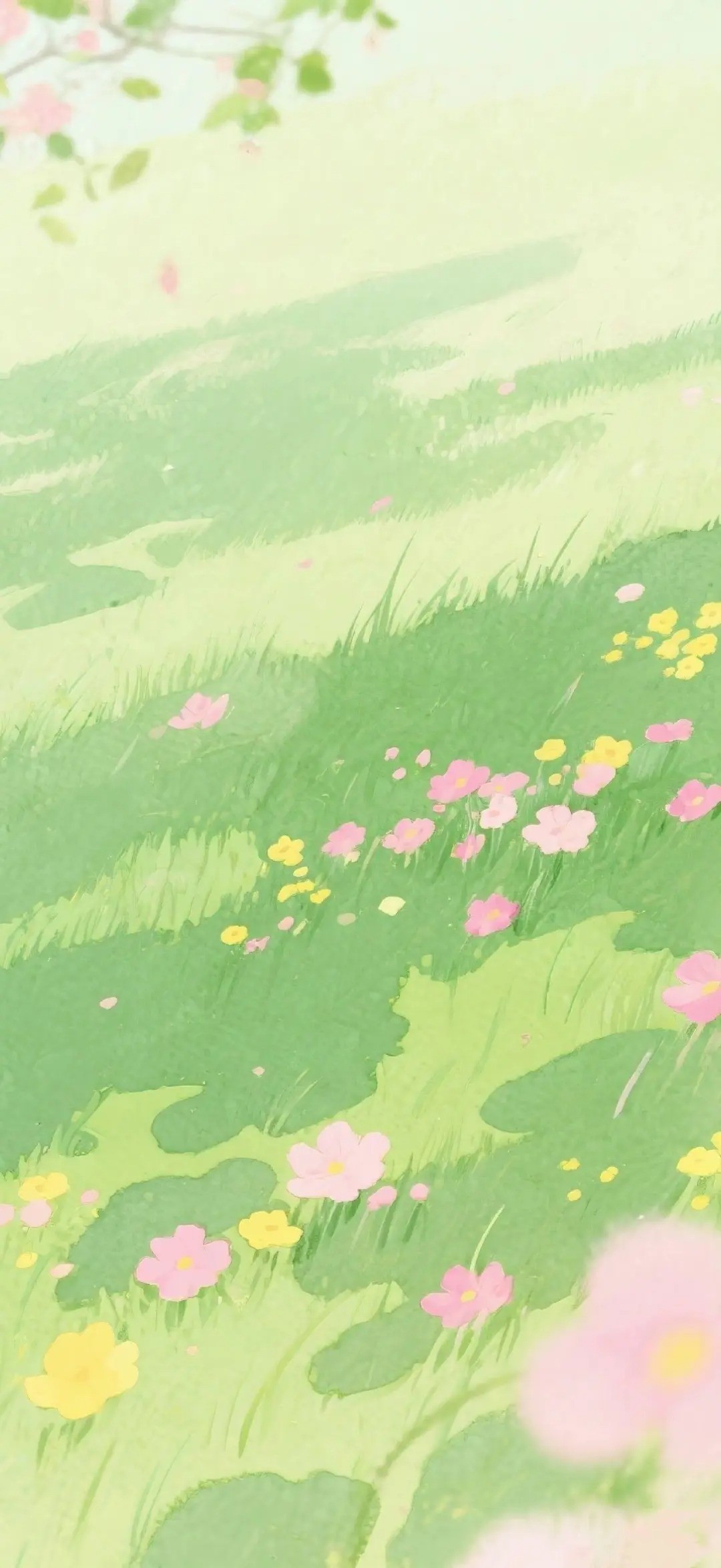 Colorful pink and yellow flowers bloom on a green spring lawn