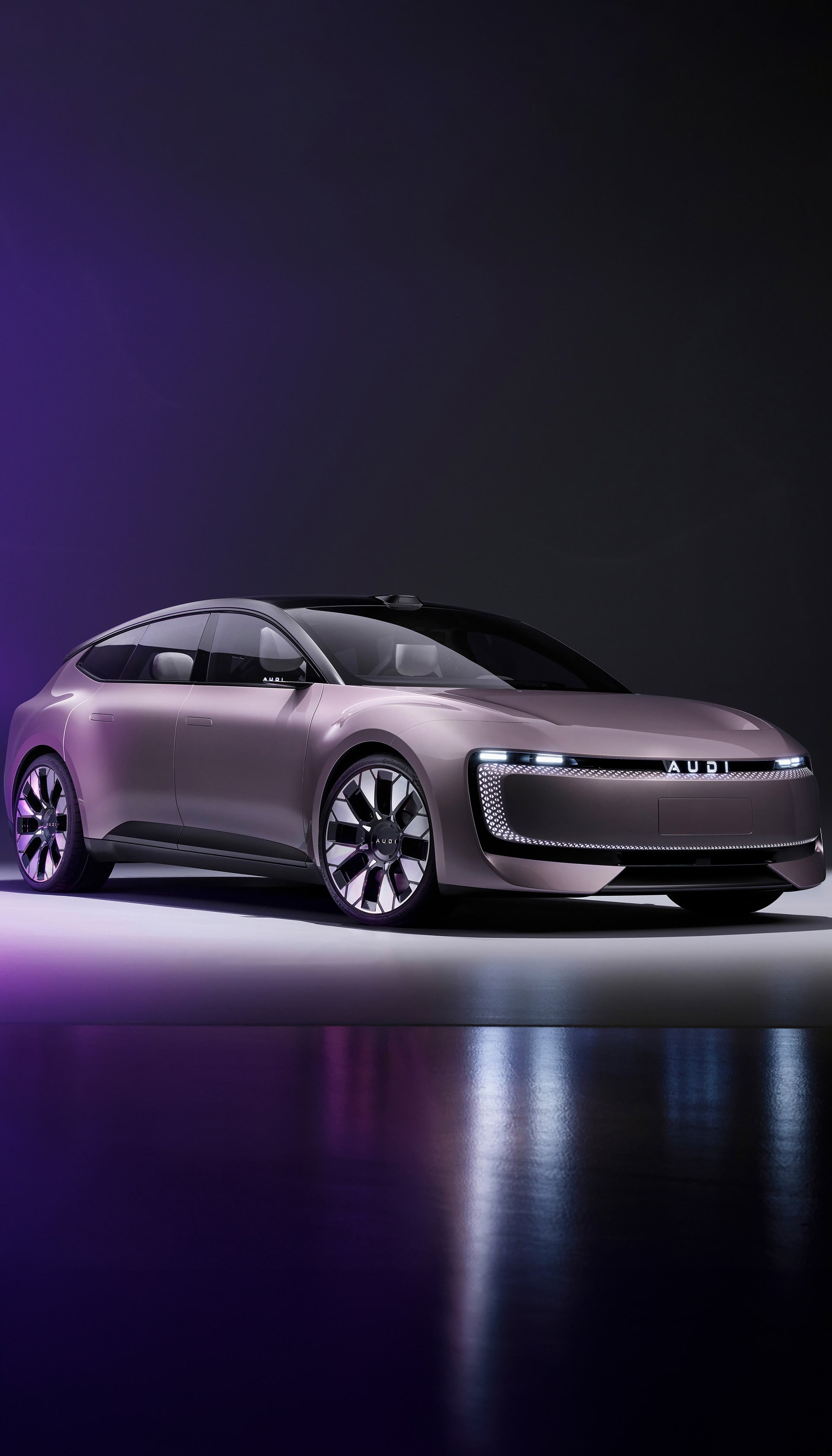 A futuristic rose-gold Audi concept car portrait