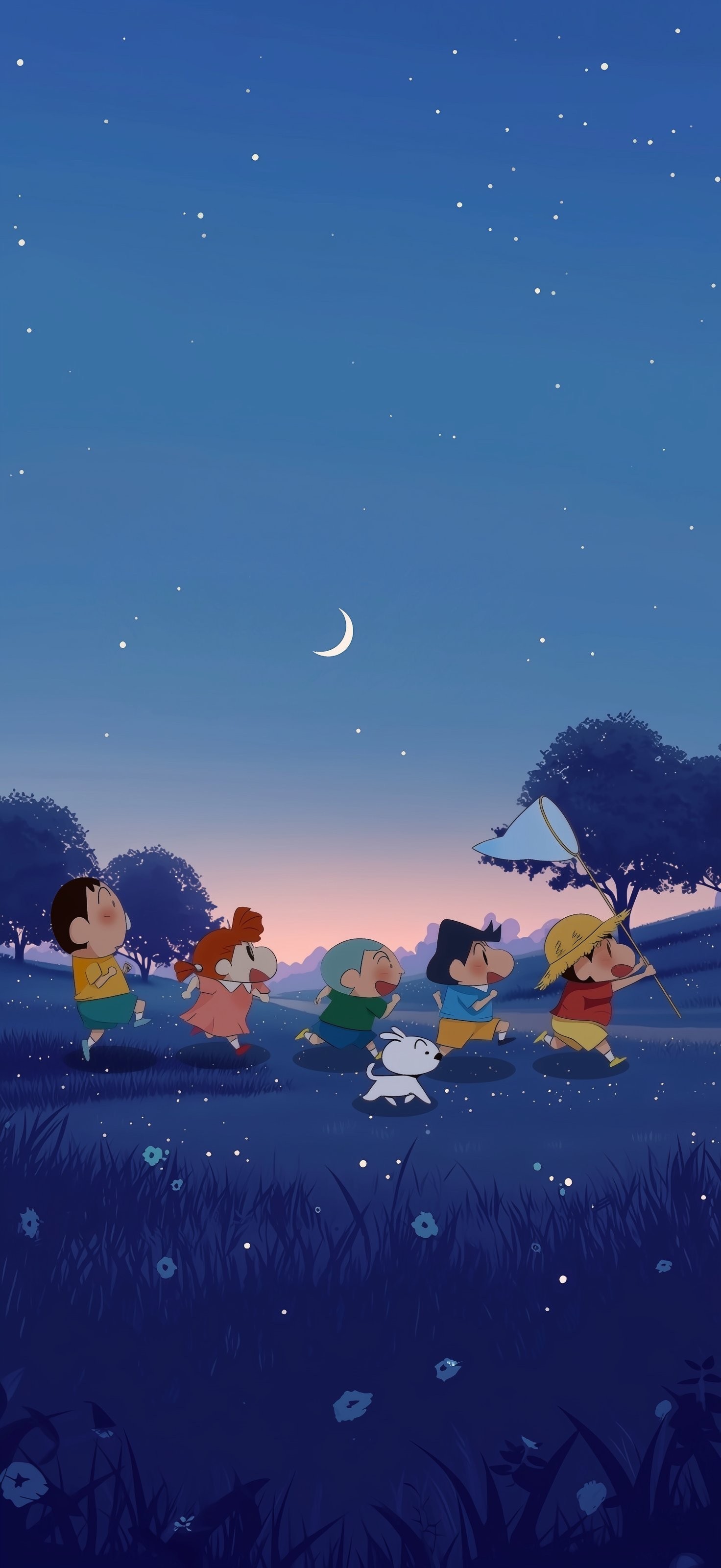Five children and a small white dog play in a meadow enjoying a summer night adventure