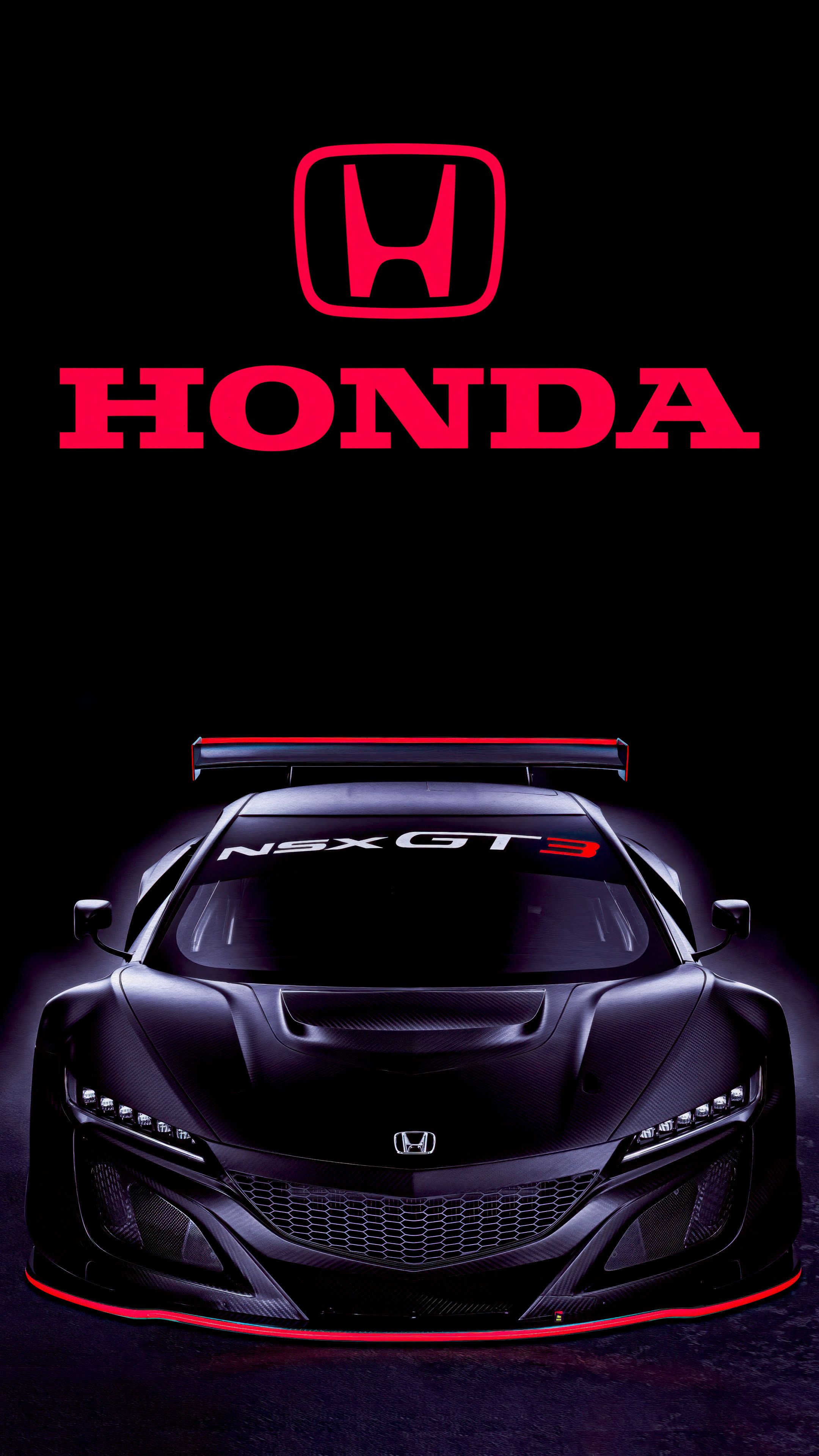 Ein dunkler Honda NSX GT3 Rennwagen steht unter einem auffälligen roten Honda-Logo
