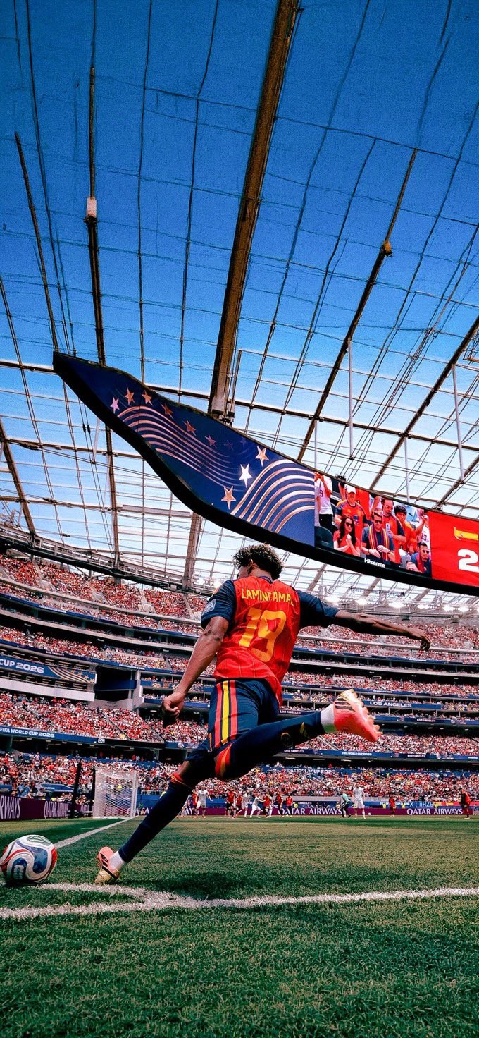 A Spanish player shoots in a stadium wearing jersey number 22