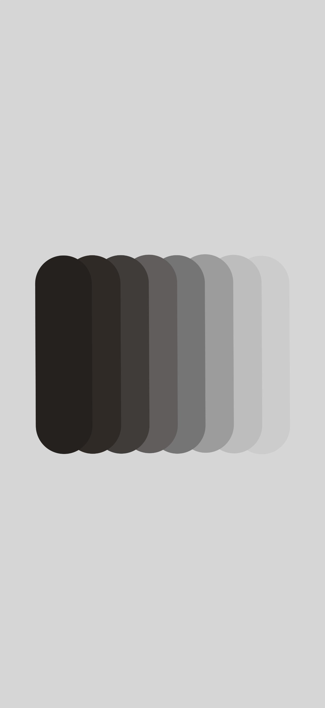 This is an abstract work featuring eight overlapping oval shapes progressing from black to nearly white