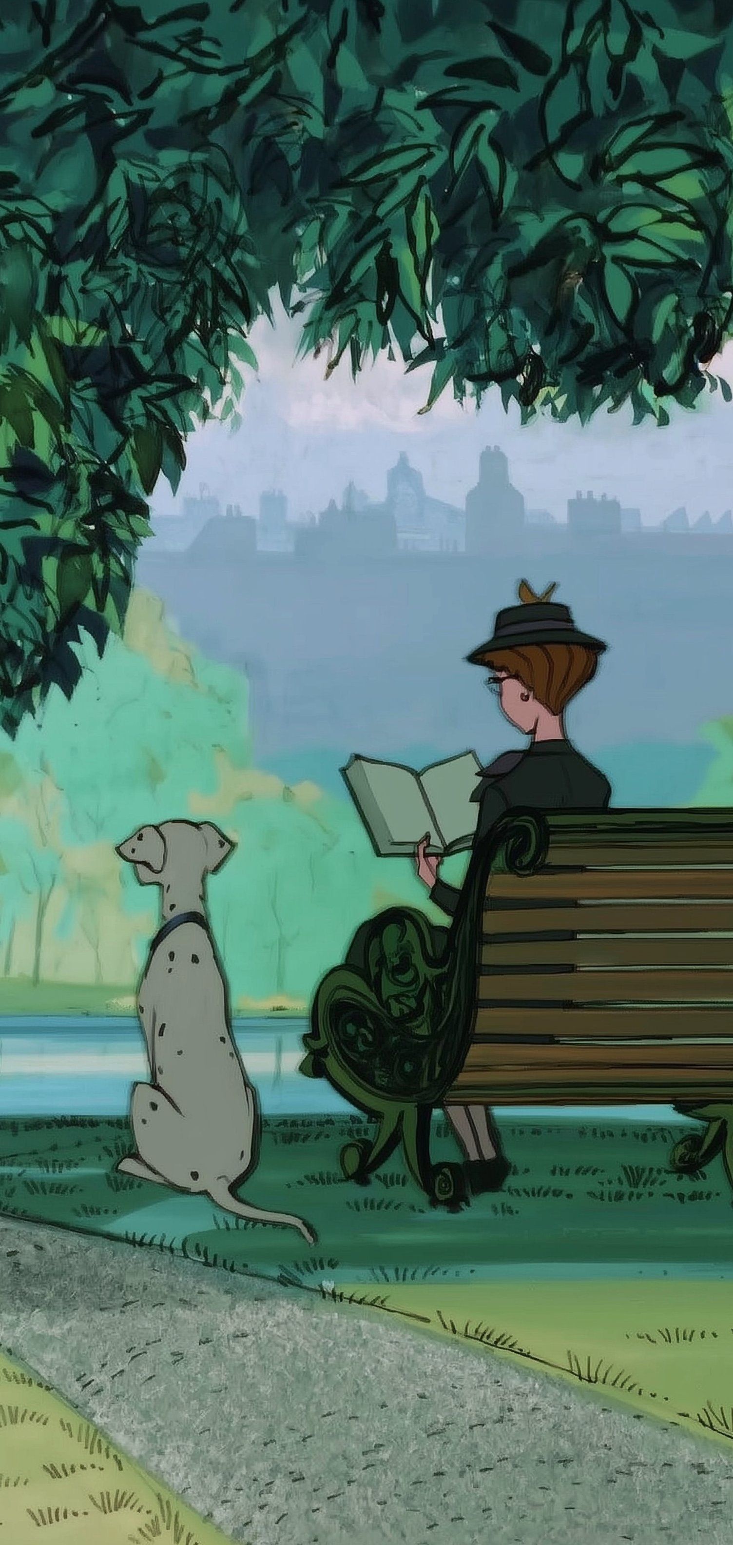 A woman sits on a park bench reading a book with a spotted dog beside her