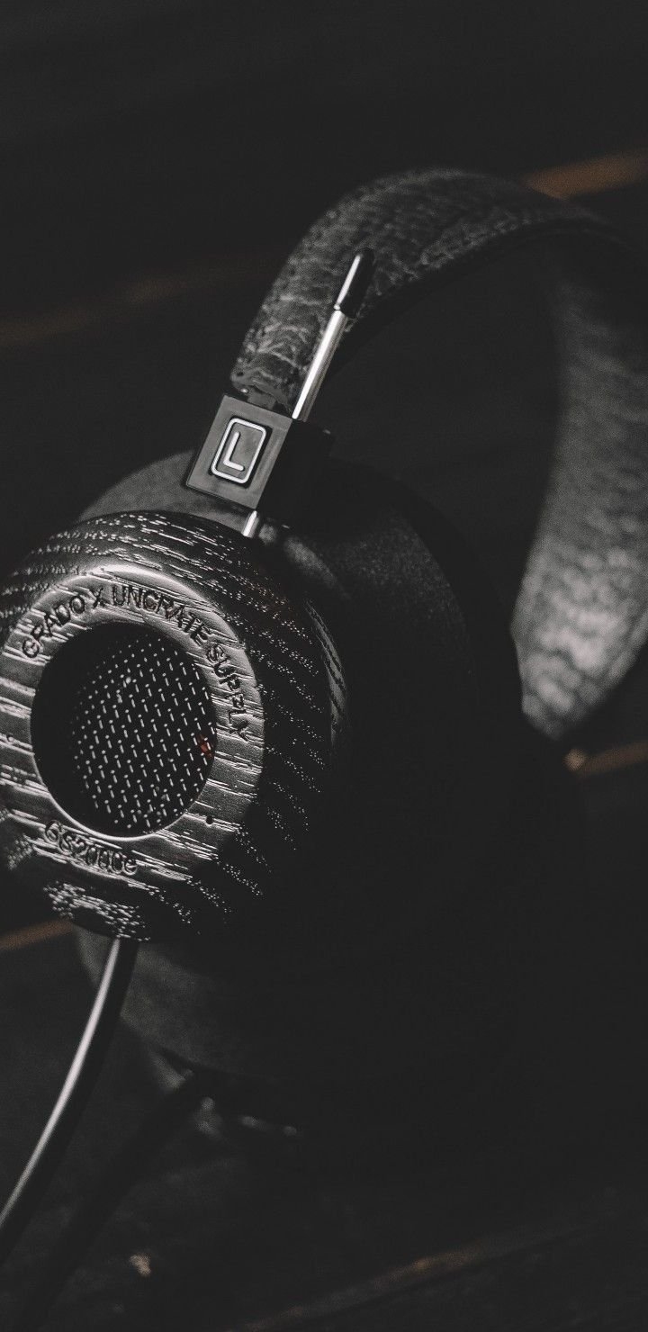 Close-up of over-ear headphones showcasing vintage texture and metal details