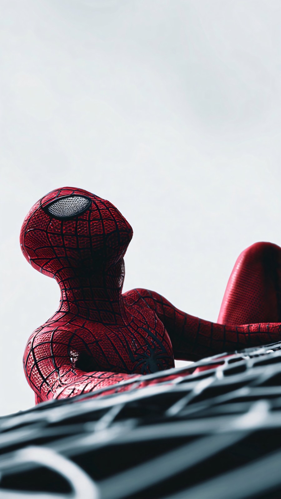 A character in a dark red suit is climbing