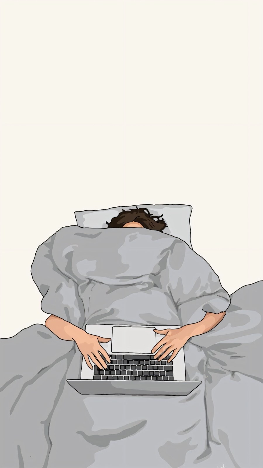 Person wrapped in gray blanket using laptop in bed